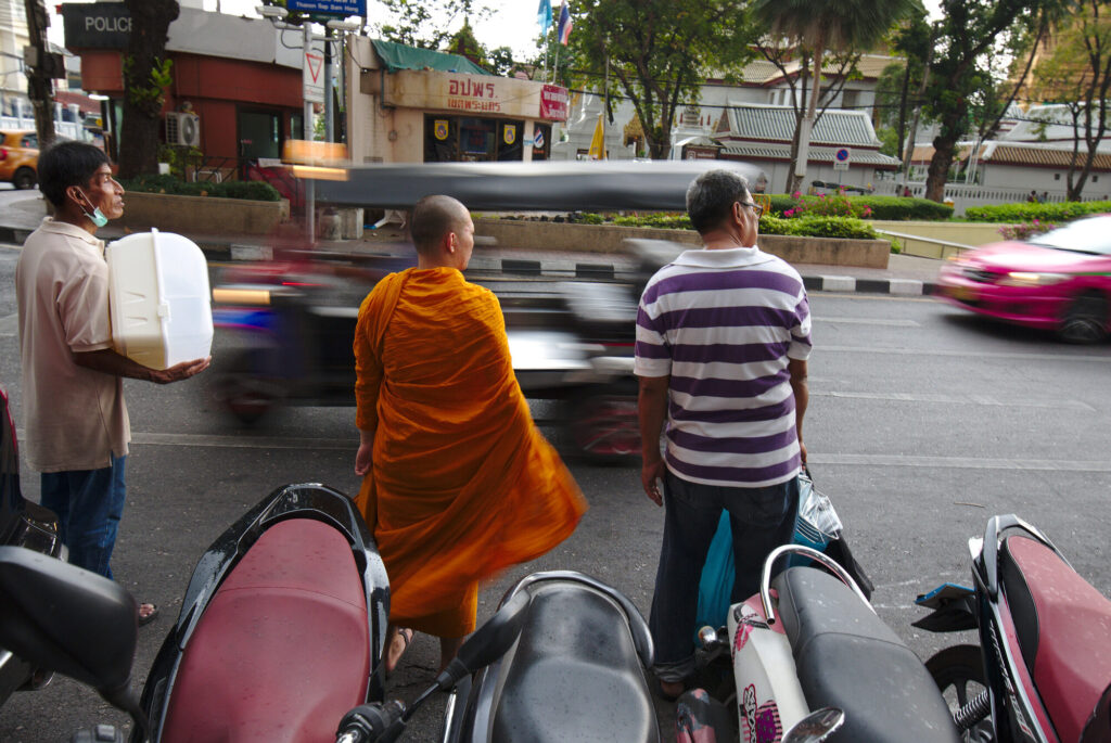 Monk crossing the traffic, Bangkok