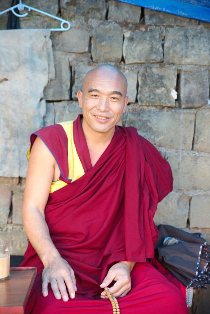 Monk with his prayer beads, Dharamshala and McLeod Ganj