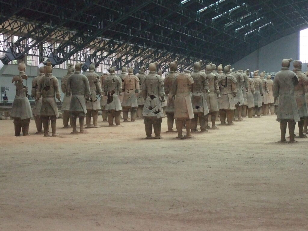 Restored warriors standing in rows, The Forbidden City and Xi'an