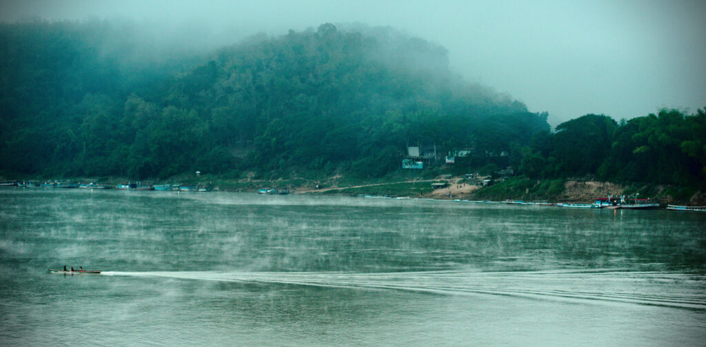Mist on the Mekong at dawn, Laos: Luang Prabang to Vientiane