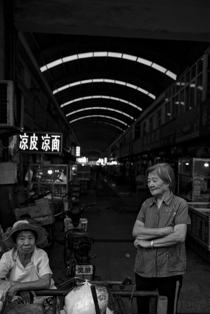 Covered market at dusk, black and white, Lutai at Mid-Autumn