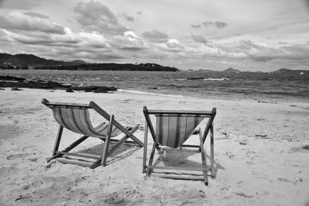 Two deckchairs, black and white, Phuket