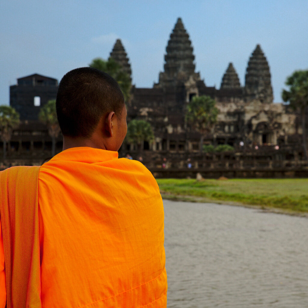 Novice monk facing Angkor Wat, Siem Reap and Angkor