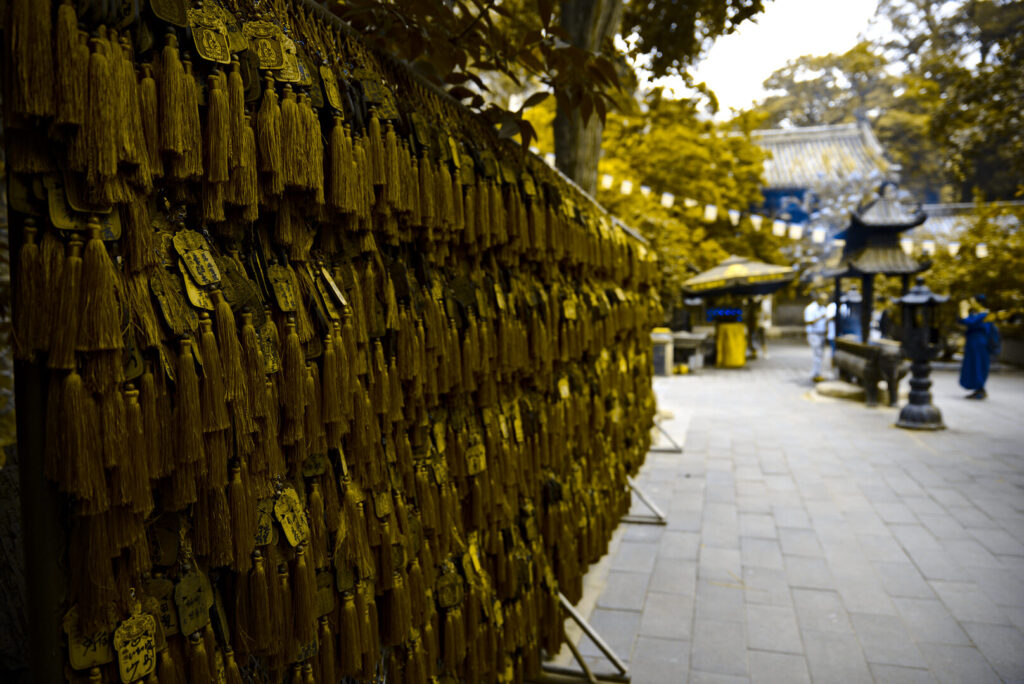 Wall of golden prayer tags, Tanzhe Temple