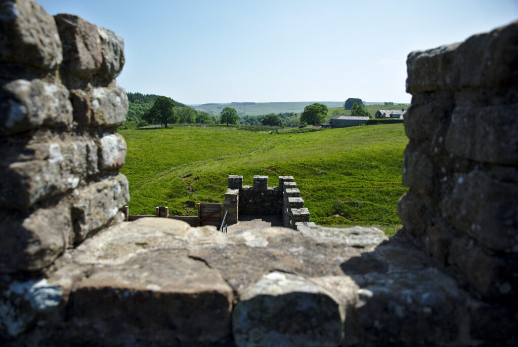 Through a gap in the rebuilt wall, Vindolanda