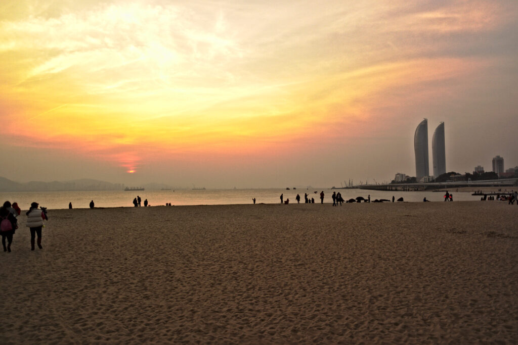 Sunset on the beach with the twin towers, Xiamen in January