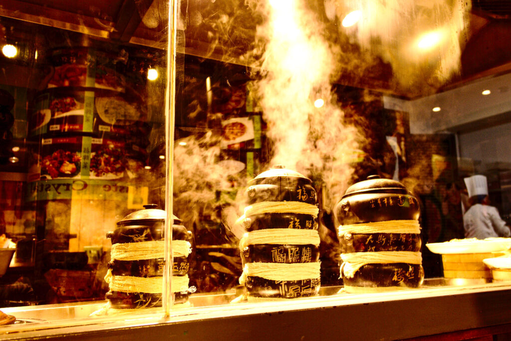 Steam pots in a kitchen window, Kunming, Yunnan: Kunming to Shangri-La